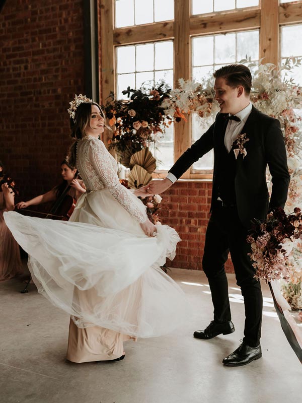 Bride & Groom at their wedding - Image by: Charlotte Griffiths Photography